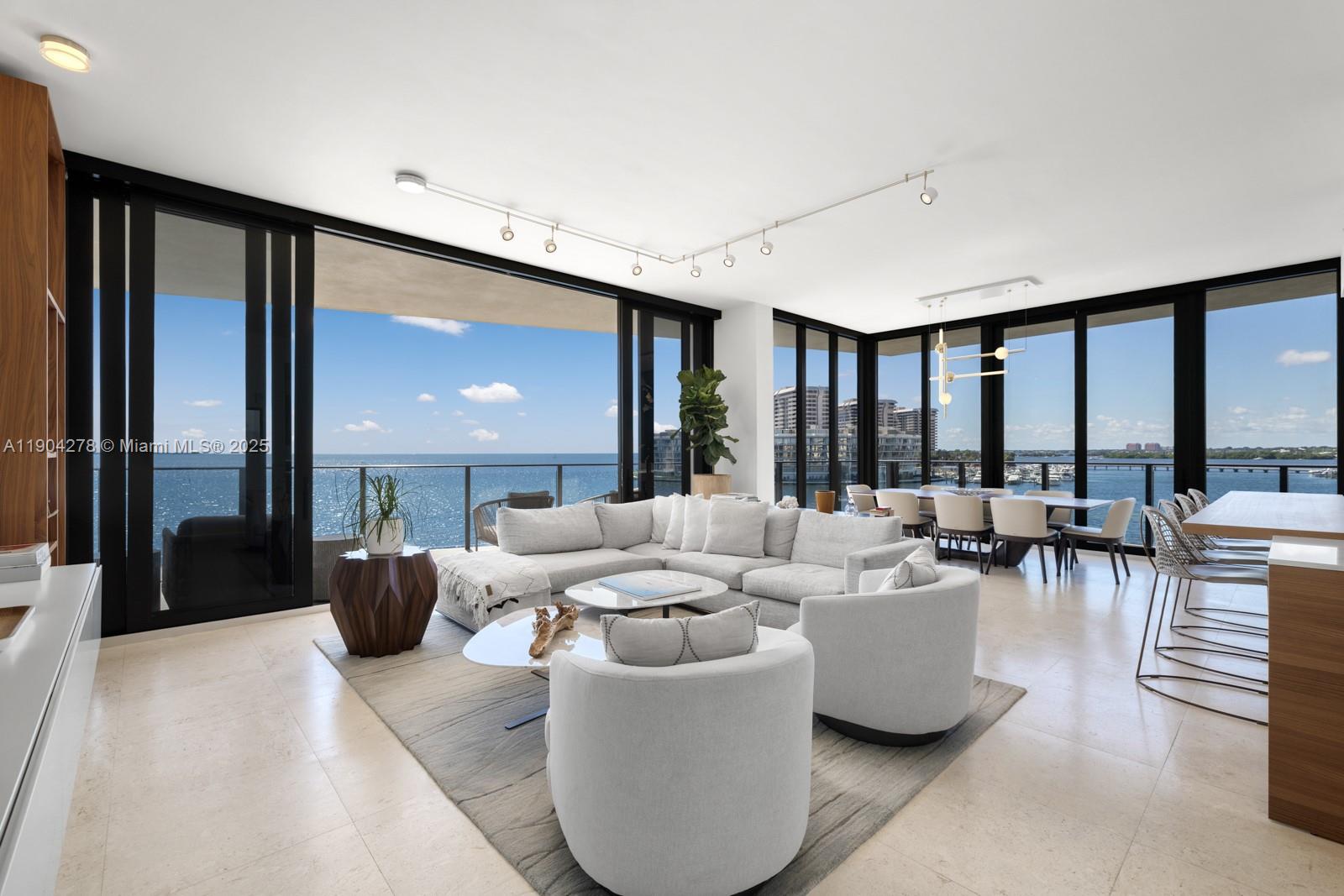 Welcome to the best line in The Fairchild, Coconut Grove—where luxury, design, and comfort converge. This 3,206 SF residence offers 4 spacious bedrooms and 5.5 baths, blending sophistication with comfort. Floor-to-ceiling windows frame panoramic bay and city views, complemented by custom window treatments and an expansive open layout ideal for entertaining. The gourmet Poliform kitchen features top-of-the-line Sub-Zero and Wolf appliances, natural stone finishes, and generous storage. Enjoy resort-style living with amenities including a heated pool, spa, sauna, hammam, rooftop deck with cabanas and grill area, state-of-the-art fitness center, and private media room. Indulge in resort-style amenities including a heated pool, spa, sauna, rooftop deck, fitness center, and outdoor BBQ area.