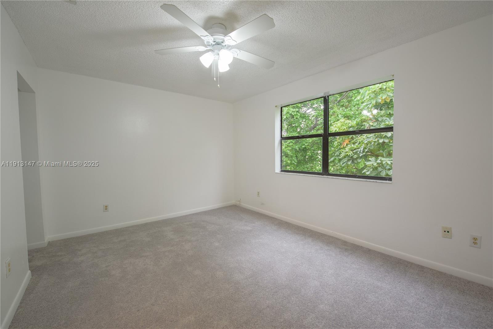 Spacious living room with panoramic views at 820 Franklin Ave - Condo in Homestead