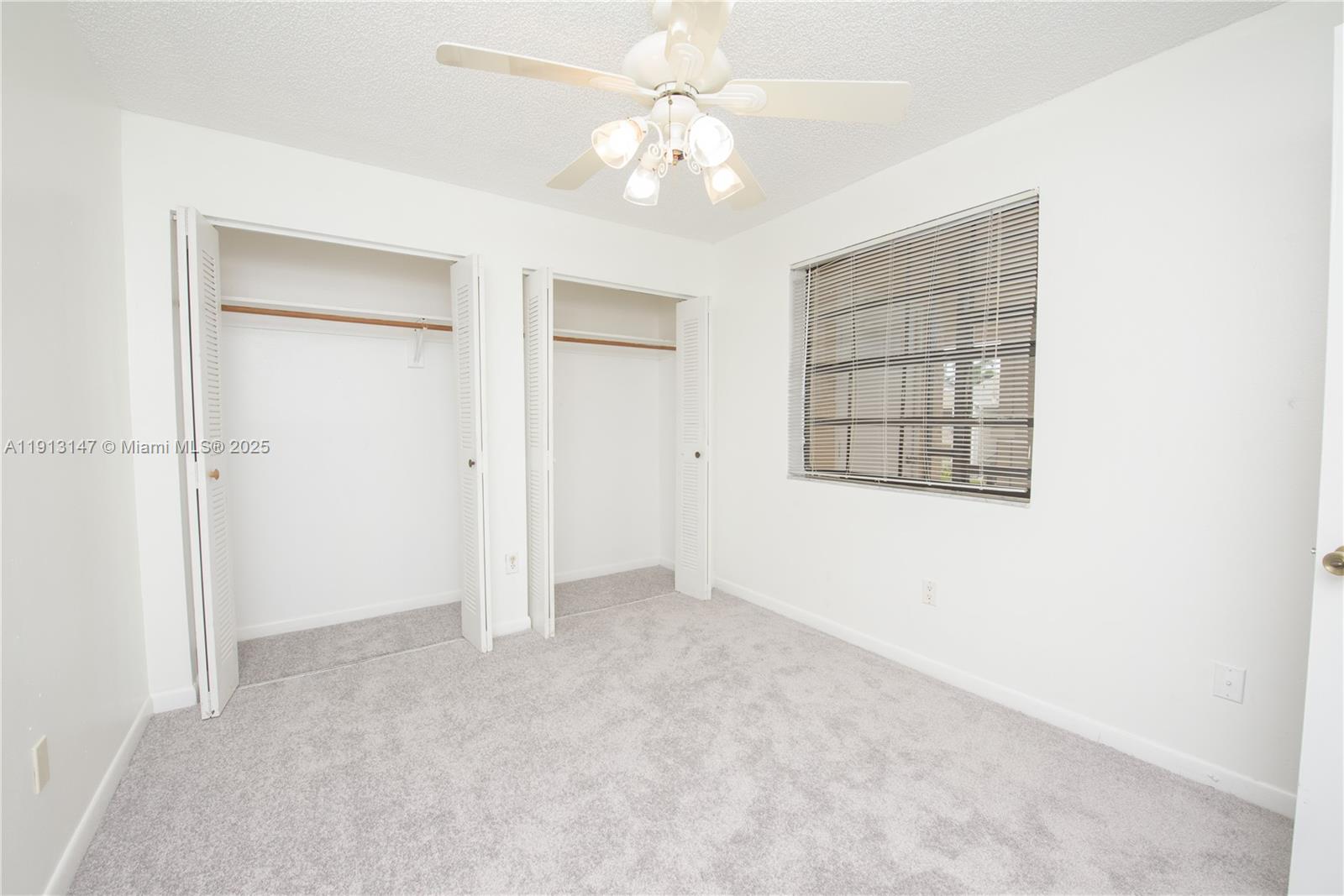 Well-appointed guest bedroom at 820 Franklin Ave - Condo in Homestead