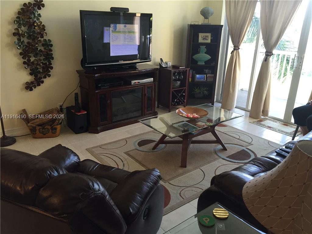 Well-appointed guest bedroom at 1341 3rd Ave - Condo in Dania Beach