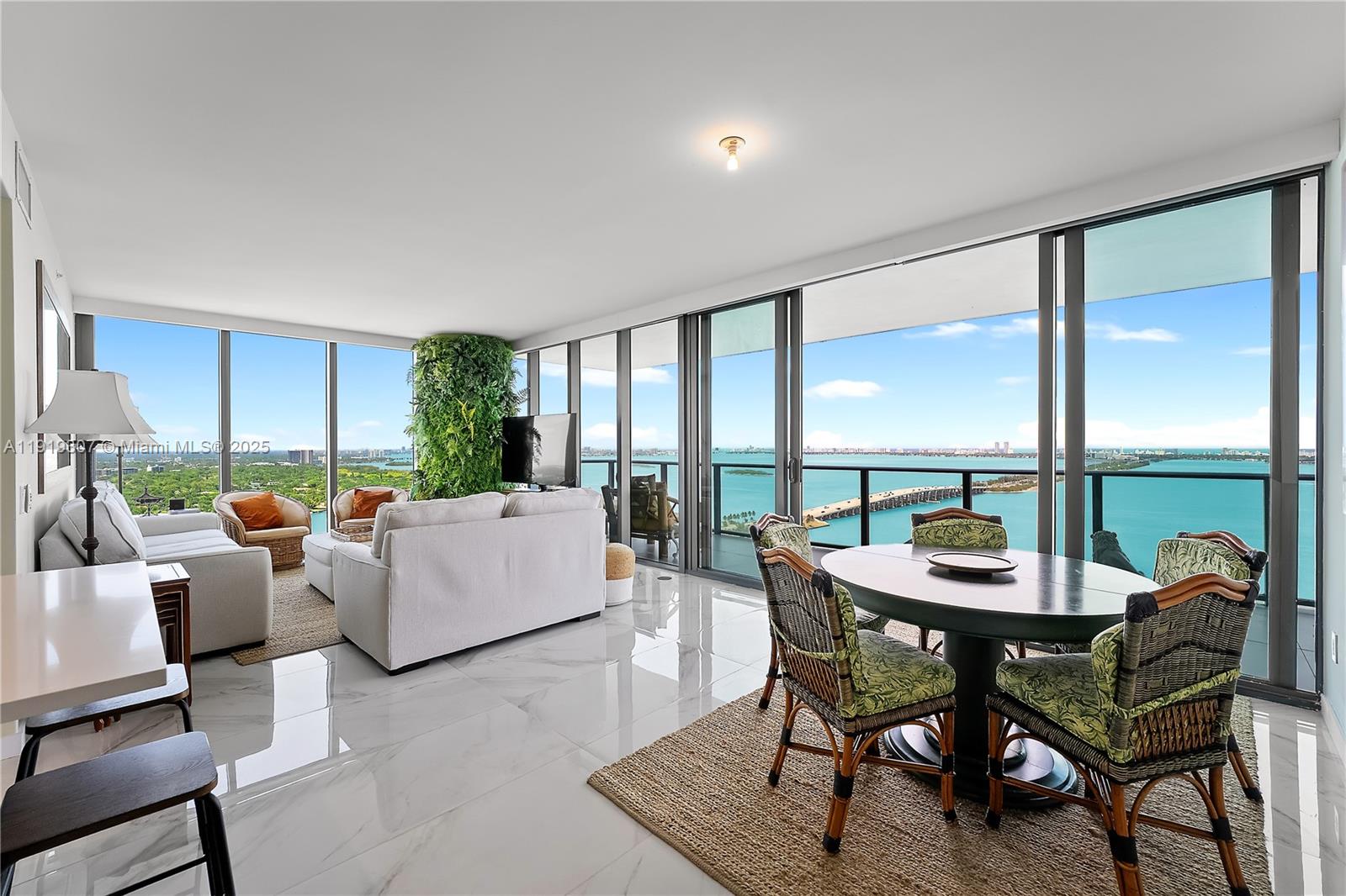 Indulge in true luxury living in this stunning corner 3-bedroom, 3.5-bath residence located in the desired One Paraiso, Edgewater. Enjoy breathtaking, unobstructed views of Biscayne Bay from every room through floor-to-ceiling windows. This elegant residence features a private elevator with a dedicated foyer, European cabinetry, Calacatta porcelain flooring, and top-of-the-line Sub-Zero and Wolf appliances. Two expansive balconies offer the perfect setting to take in both sunrise and sunset views. Residents enjoy world-class amenities, including two Olympic-sized infinity pools, jacuzzis, a state-of-the-art fitness center overlooking the bay, yoga and spinning studios, full-service spa with sauna and steam room, lounge, business center, kids’ club, private movie theater, and more.