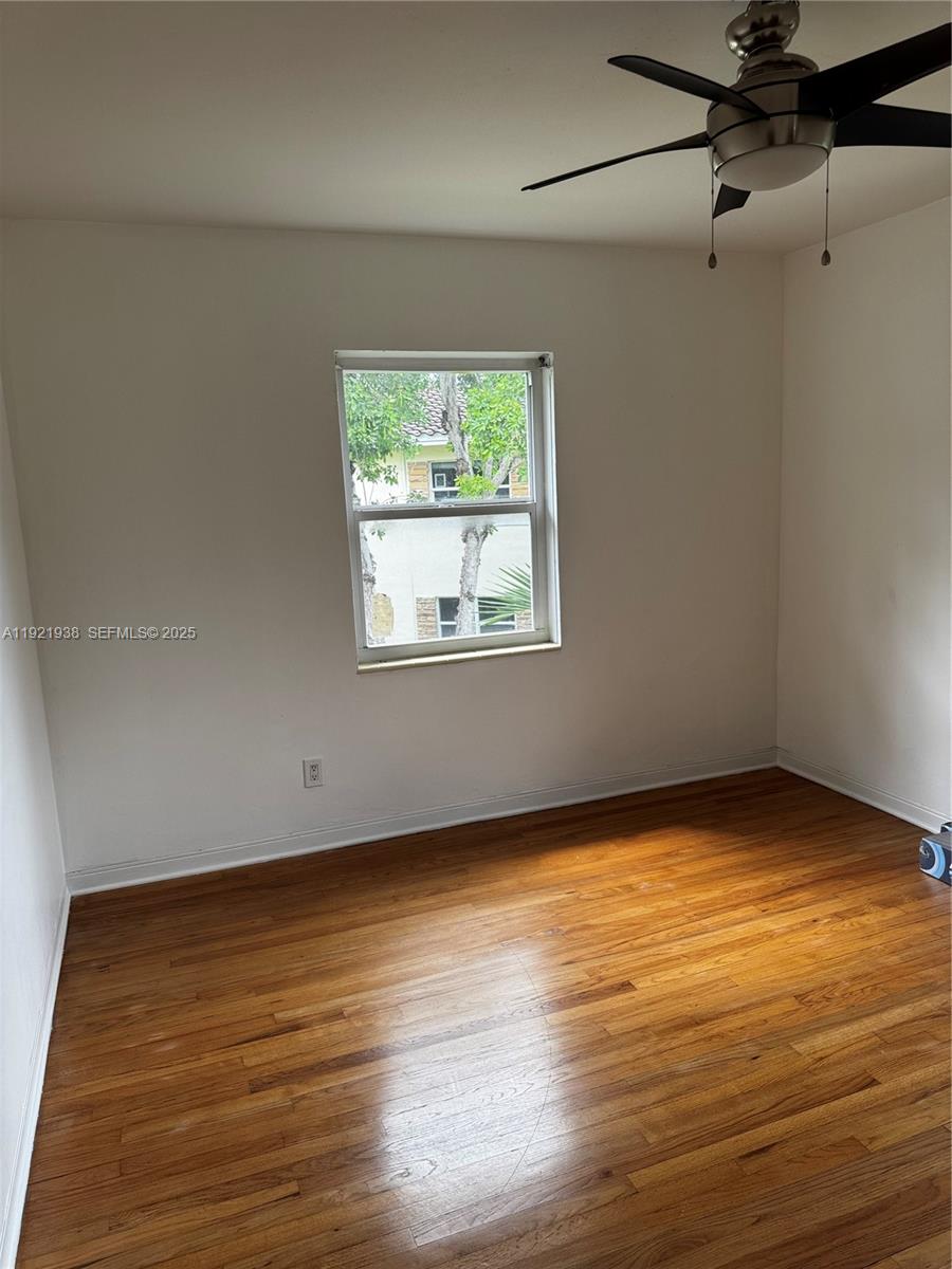 Well-appointed guest bedroom at 725 91st St - Condo in Miami Shores