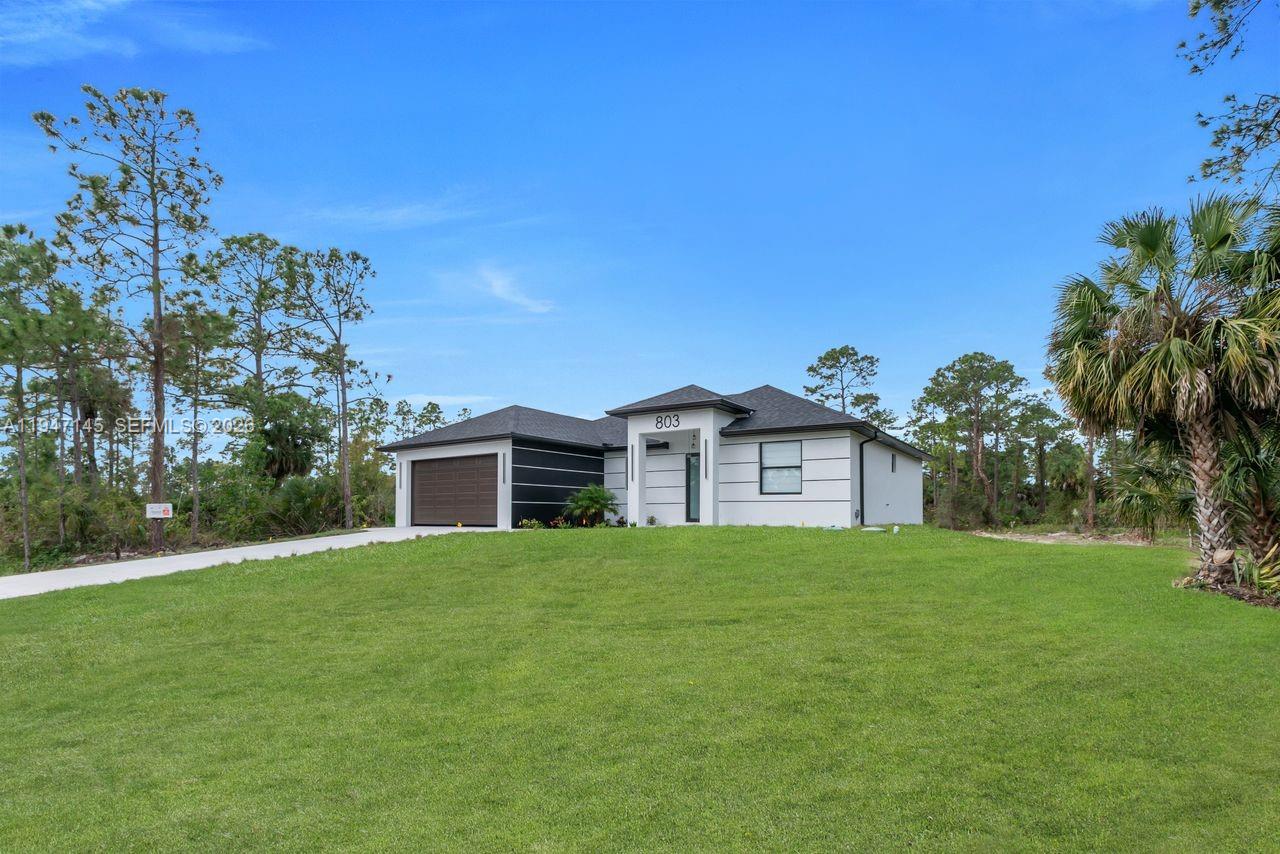 Impressive exterior facade at 803 Desoto Ave - Home in Lehigh Acres