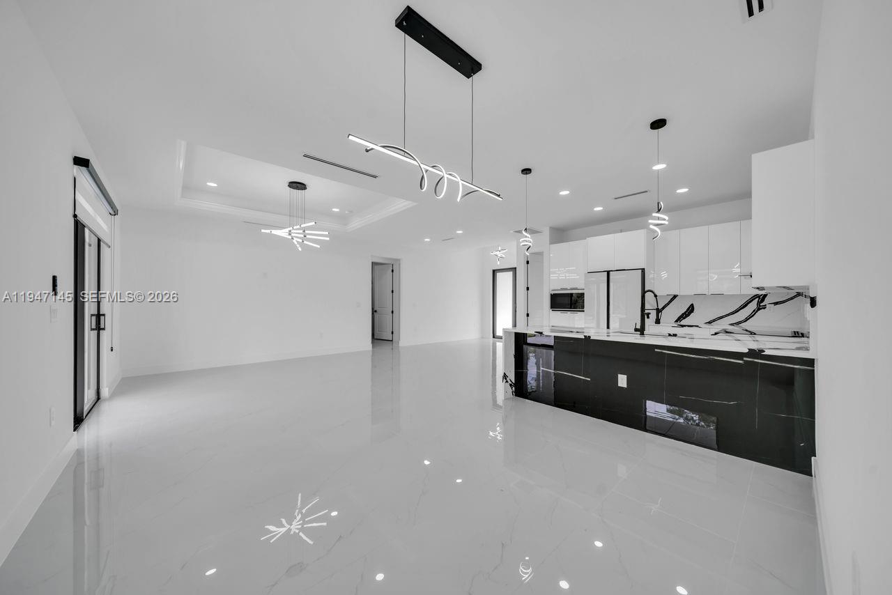 Elegant master bedroom retreat at 803 Desoto Ave - Home in Lehigh Acres
