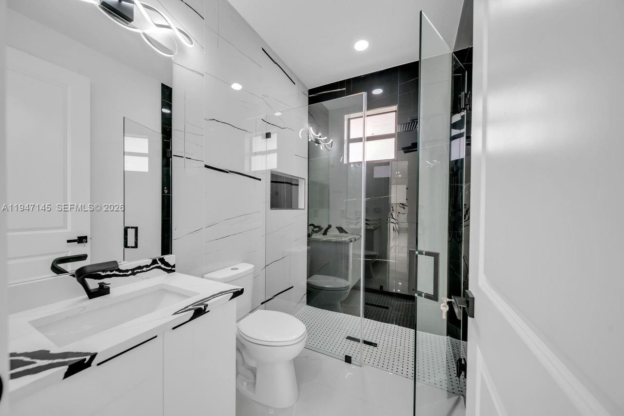 Well-appointed guest bedroom at 803 Desoto Ave - Home in Lehigh Acres