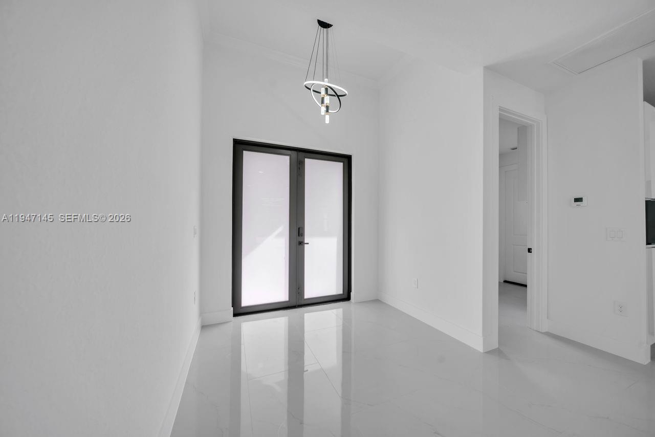 Open-concept living area at 803 Desoto Ave - Home in Lehigh Acres