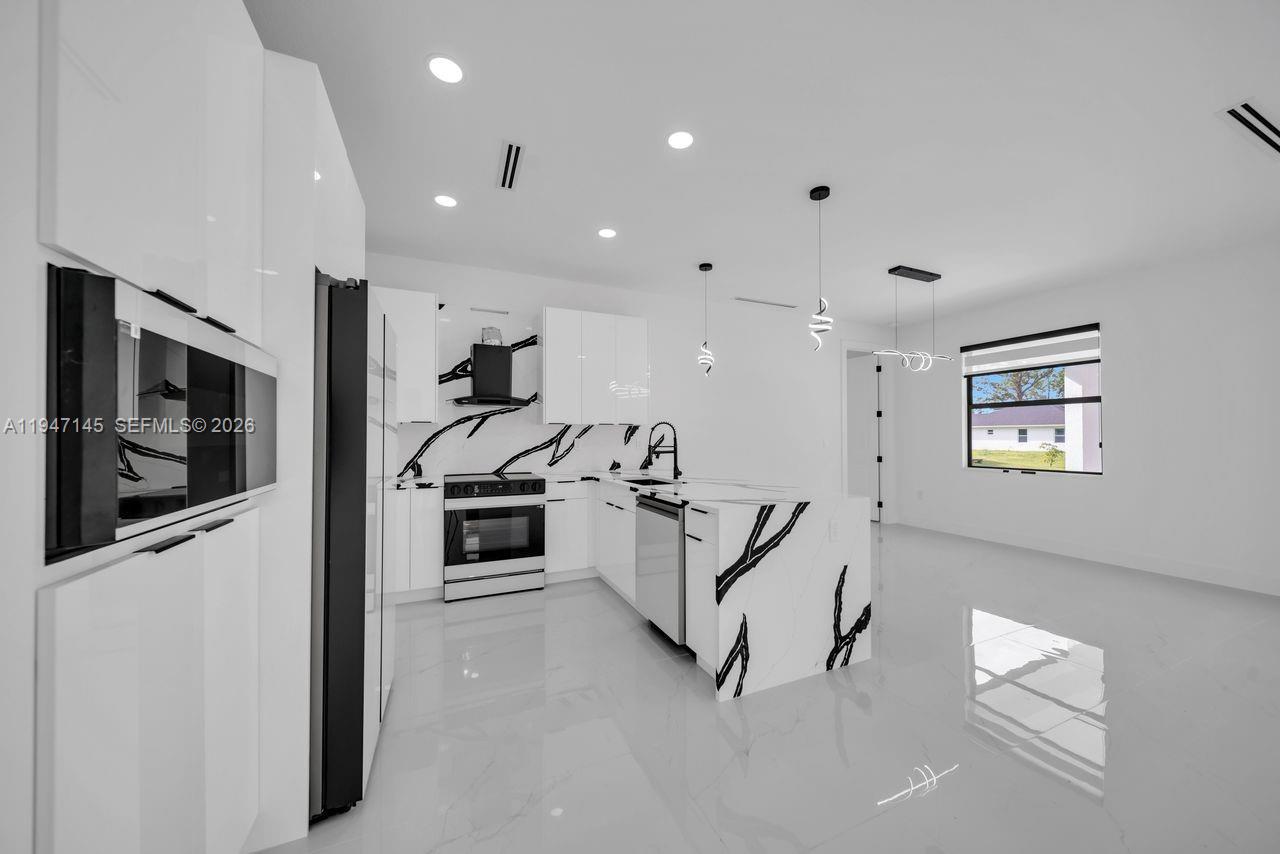 Designer master bathroom at 803 Desoto Ave - Home in Lehigh Acres