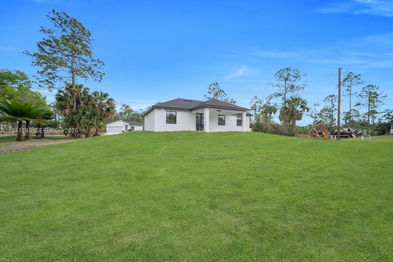 Spacious garage and storage at 803 Desoto Ave - Home in Lehigh Acres