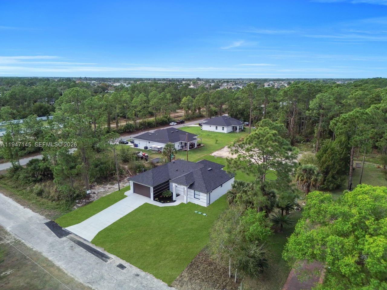 Modern kitchen with designer features at 803 Desoto Ave - Home in Lehigh Acres