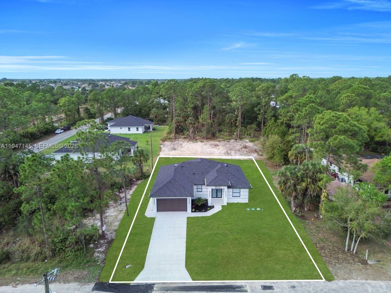 Elegant master bedroom retreat at 803 Desoto Ave - Home in Lehigh Acres