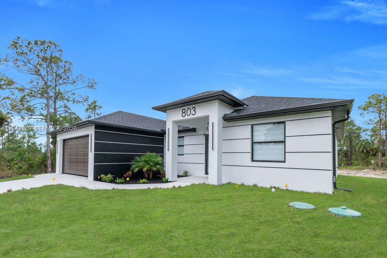 Elegant master bedroom retreat at 803 Desoto Ave - Home in Lehigh Acres