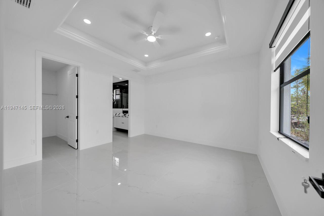 Spacious garage and storage at 803 Desoto Ave - Home in Lehigh Acres