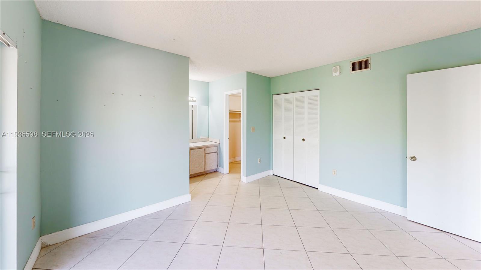 Designer master bathroom at 1300 122nd Ave - Condo in Miami