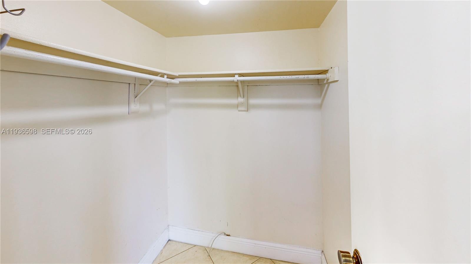 Spacious living room with panoramic views at 1300 122nd Ave - Condo in Miami