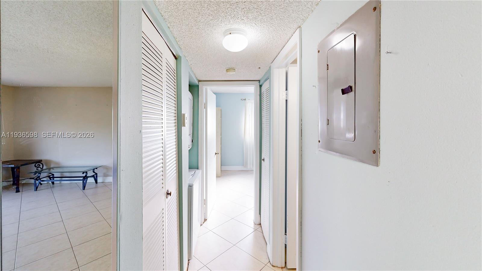 Modern kitchen with designer features at 1300 122nd Ave - Condo in Miami