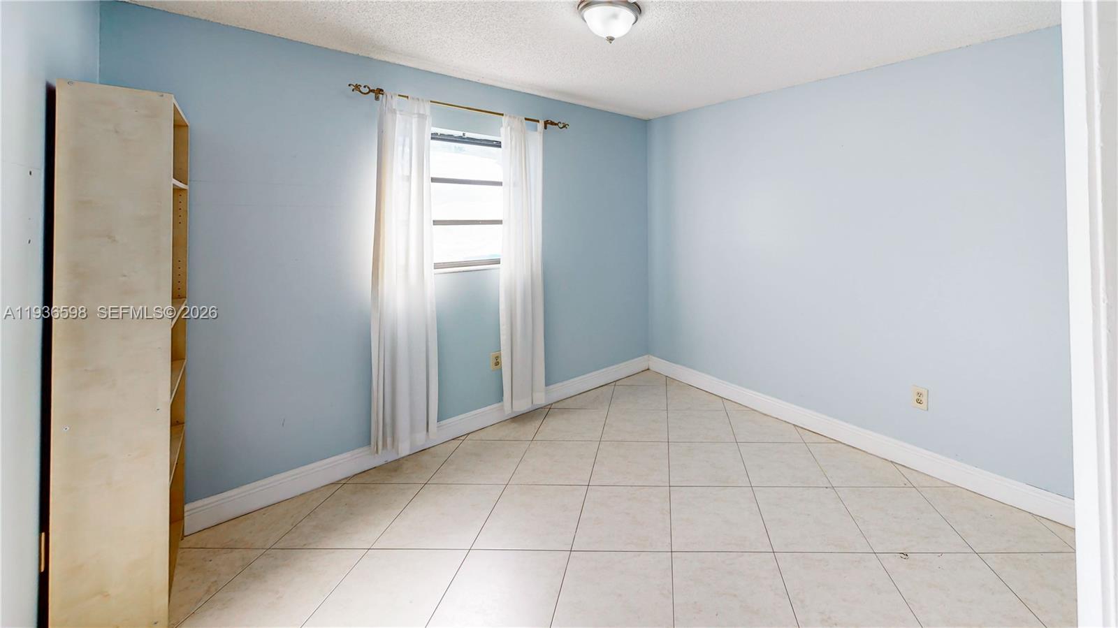 Elegant master bedroom retreat at 1300 122nd Ave - Condo in Miami