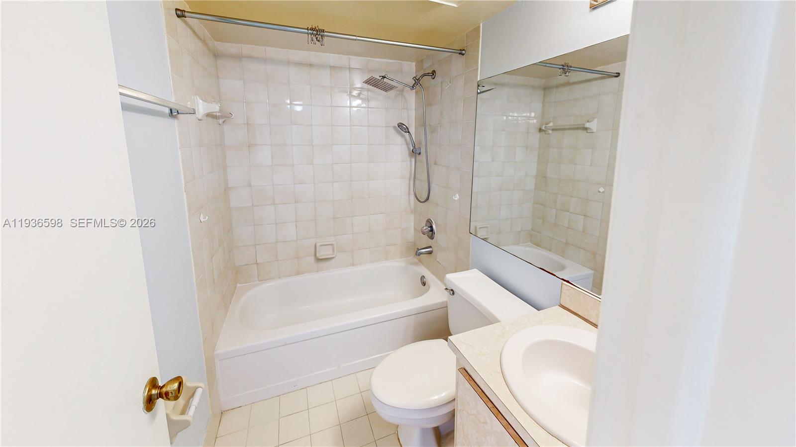 Well-appointed guest bedroom at 1300 122nd Ave - Condo in Miami
