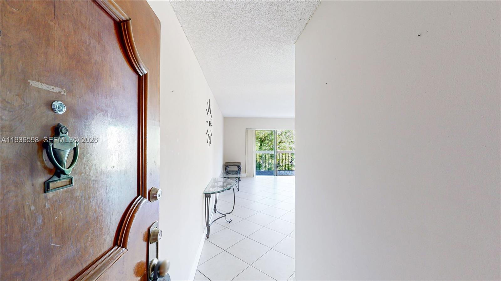 Modern kitchen with designer features at 1300 122nd Ave - Condo in Miami
