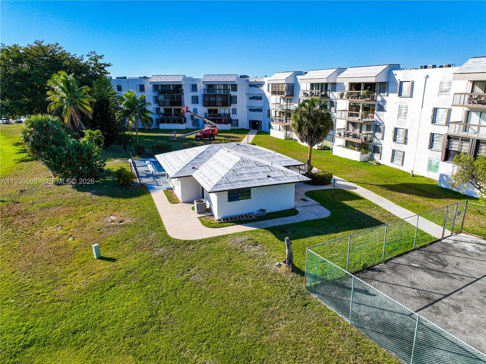 Modern kitchen with designer features at 1300 122nd Ave - Condo in Miami
