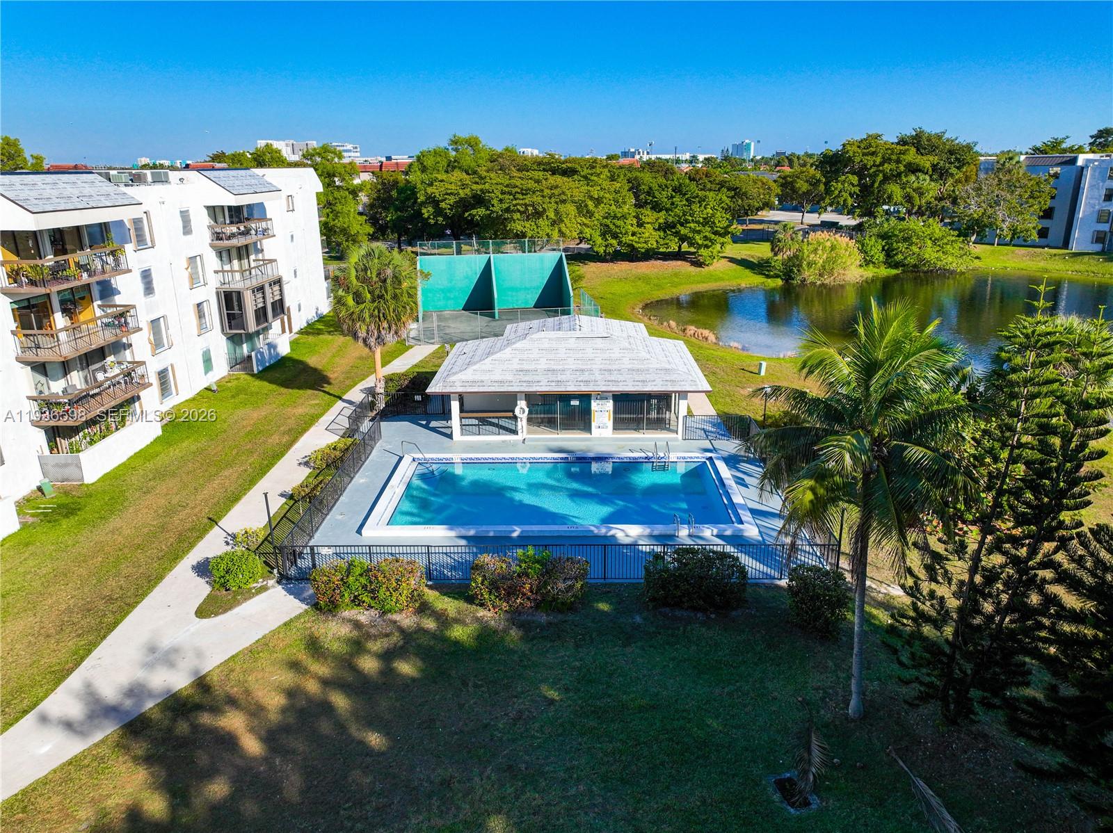 Elegant master bedroom retreat at 1300 122nd Ave - Condo in Miami