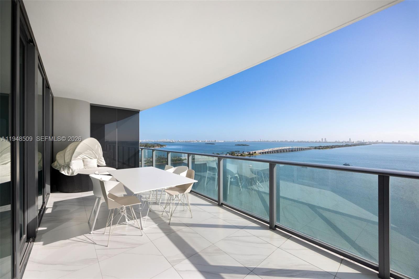 Spacious and light-filled 1 Bed + Den residence at One Paraiso, offering a well-proportioned layout designed for modern living. The open kitchen features contemporary finishes and flows seamlessly into the living area, framed by floor-to-ceiling windows that bring in abundant natural light. A private balcony extends the living space and offers a tranquil outdoor retreat. The primary bedroom is generously sized, with ample storage and a clean, modern aesthetic throughout. One Paraiso is a full-service waterfront building in the heart of Edgewater, offering resort-style amenities including multiple pools, state-of-the-art fitness center, spa, tennis courts, theater room, party and social spaces, kids’ playroom, 24-hour concierge, and security. Residents enjoy direct access to the Paraiso Baywalk, perfect for walking, jogging, or enjoying bayfront views. Ideally located next to Amara at Paraiso and minutes from Midtown, Wynwood, the Design District, Downtown Miami, and Miami Beach. An excellent opportunity for end users or investors seeking luxury, convenience, and a true waterfront lifestyle.