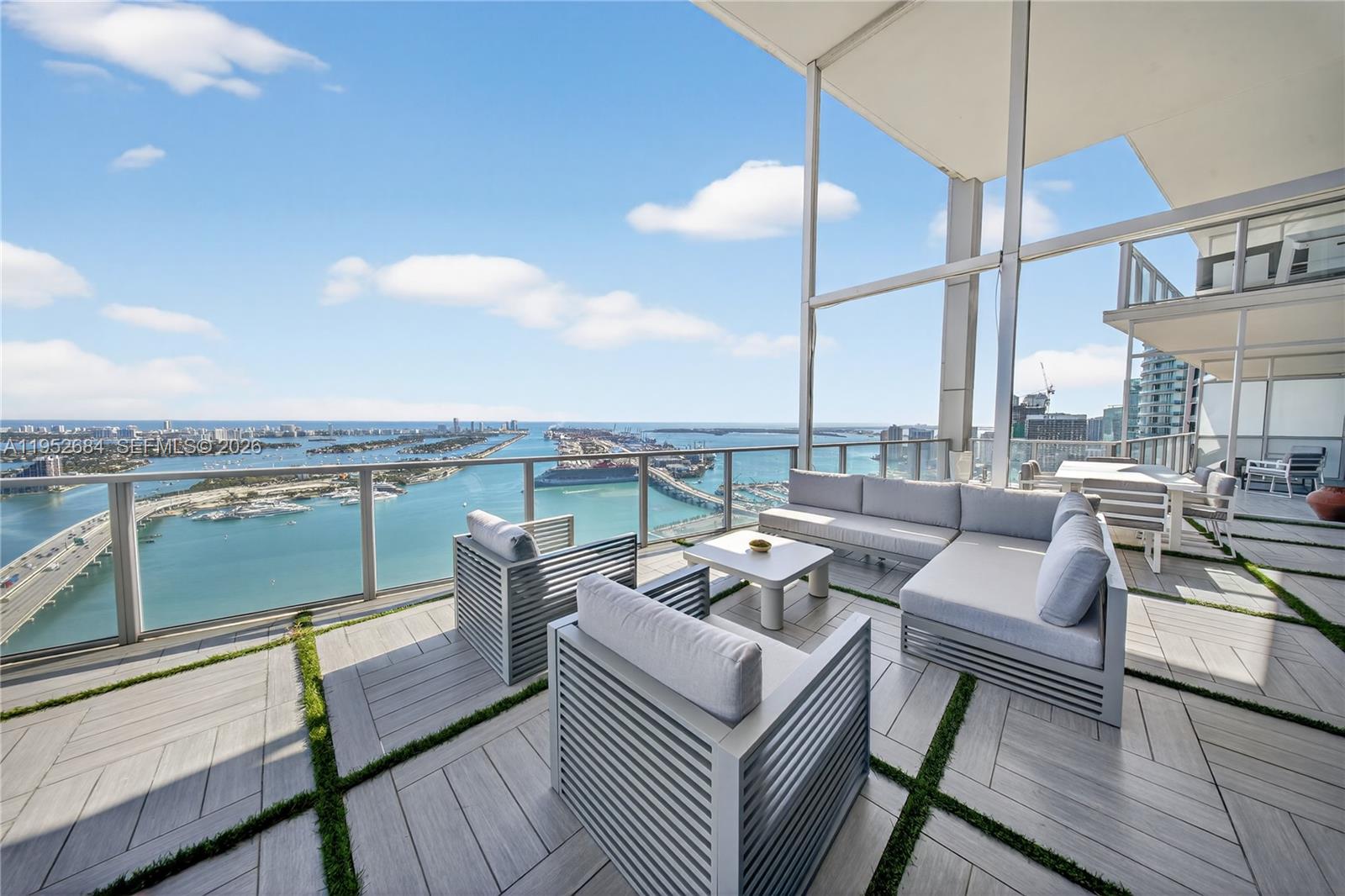 A Private Sky Estate at Marquis Residences Oceanfront Trophy Living.Rising above the Miami skyline, this extraordinary combined residence offers nearly 7,000 square feet of refined interior living space with unobstructed ocean and skyline views and the best price per square foot in Downtown Miami’s luxury segment. Seamlessly integrating three residences (5306, 5305 & 5304), this one of a kind home features 6 expansive bedrooms, 6 full bathrooms, and 2 half baths, designed for elevated living at the highest level. Walls of floor to ceiling glass frame breathtaking panoramic views, flooding the residence with natural light and creating an ever changing backdrop of water, sky, and city lights.The primary suite is a private retreat in the sky, offering incredible panoramic views and its own dry sauna for a true spa-like experience. A dedicated theater room and a stunning main level executive office with spectacular open views provide both comfort and functionality within the home.Grand living areas flow effortlessly for large scale entertaining while maintaining warmth and intimacy. This is high rise living without compromise scale, privacy, and presence rarely found in the sky.The residence includes 4 assigned parking spaces and access to the full service lifestyle of Marquis. Ideally located in the cultural and financial heart of Miami. An irreplaceable opportunity to acquire a trophy-scale residence at unmatched value per sft. Cryptocurrency transactions are welcome.