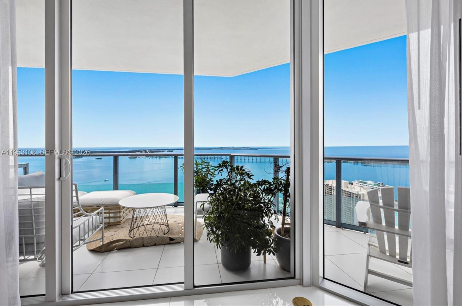 Exceptional corner unit with direct views of Biscayne Bay. True 3 bed, 2.5 bath. This unit has floor-to-ceiling windows with bay and city skyline view, east and west view. Enjoy Miami's most spectacular sunrise and sunsets. Marble floors and electrical blinds and many upgrades. Resort style amenities include 2 pools, cabanas, BBQ area, club room, kids lounge, family areas, 24 hr concierge and security, valet, and Brickell's most beautiful lobby. Fully equipped state-of-the-art fitness center and private owner's lounge with event bar and catering kitchen, theatre, and spa. Rooftop pool. The unit is perfect for end users or investors. Building has two of the most spectacular restaurants in Brickell-LPM and OSAKA at your doorstep. Please allow 24 hrs to schedule showings.