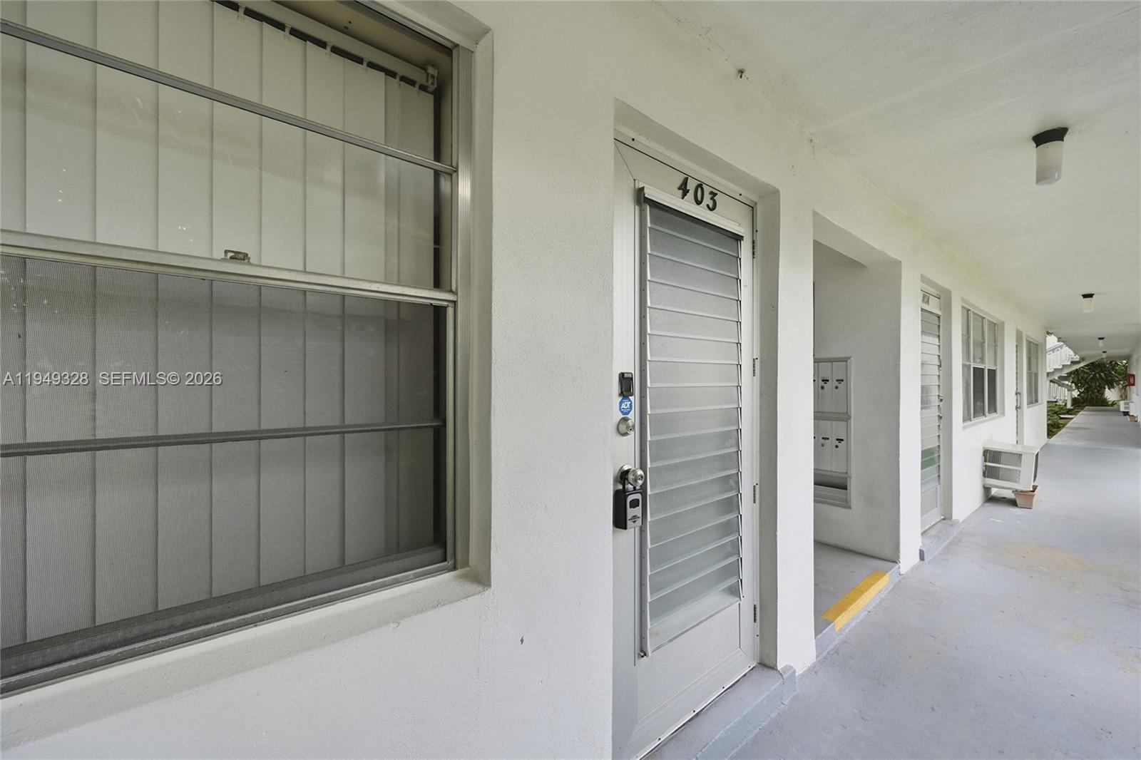 Open-concept living area at 403 Sheffield Q - Condo in West Palm Beach