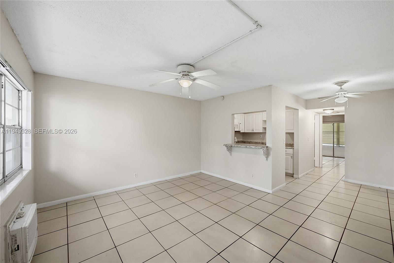 Modern kitchen with designer features at 403 Sheffield Q - Condo in West Palm Beach
