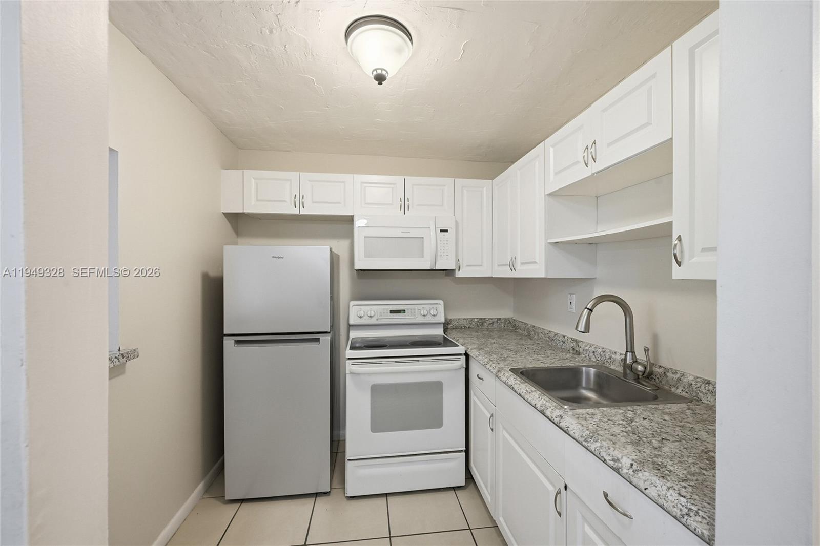 Designer master bathroom at 403 Sheffield Q - Condo in West Palm Beach
