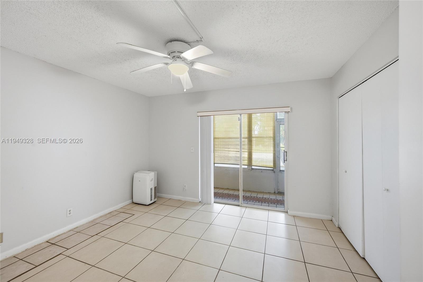 Well-appointed guest bedroom at 403 Sheffield Q - Condo in West Palm Beach