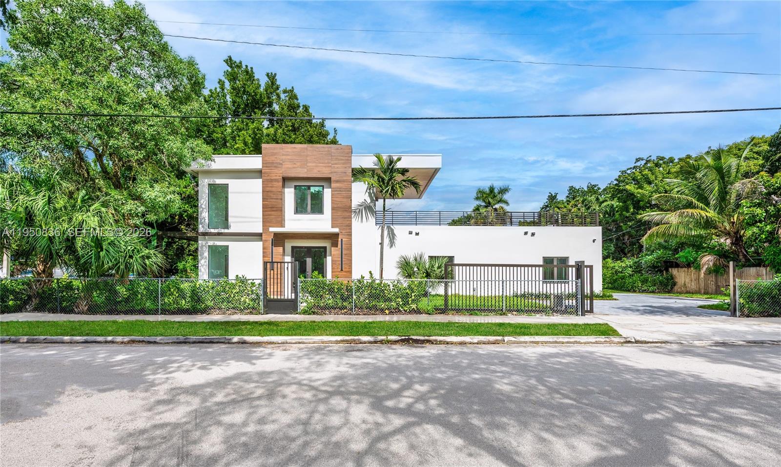 Brand new construction at the desirable The Roads. 4 bedrooms and 3.5 bathrooms. 3,300 Sq Ft on 2 floors. 2 master bedrooms, one at the 1st floor and the main master on 2nd floor. Spectacular rooftop looking at Brickell skyline view including a relaxing jacuzzi. Custom made spec property. Everything designed for this property! Great pantry and additional deposit under stairs. Security cams and sound managed by cell phone. Close to Brickell, Coconut Grove and Key Biscayne. Enjoy the living on a single-family home just at steps to Brickell entertainment area.