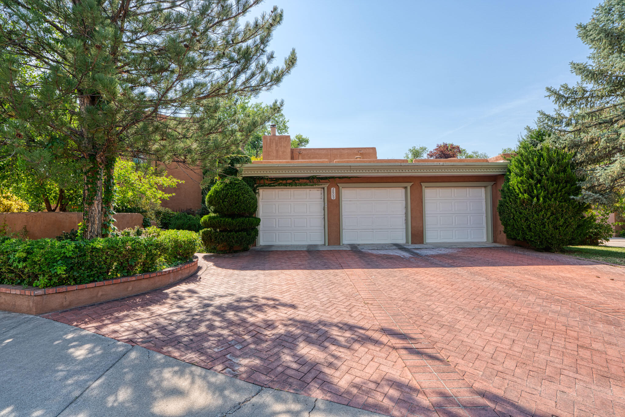 This is a Very rare oppurtunity to own a stunning home in the Rio Grande Compound! Backing up to the Bosque and Rio Grande River, this gorgeous home offers a newly renovated master bathroom, new flooring throughout, 3 fireplaces, and a huge 3 car garage! Conveniently located in the heart of the north valley just minutes to I-40 for easy freeway access. The home is steps away from the Bosque where one can enjoy hiking and biking trails. Live among the cottonwoods in this gorgeous gated north valley neighborhood!