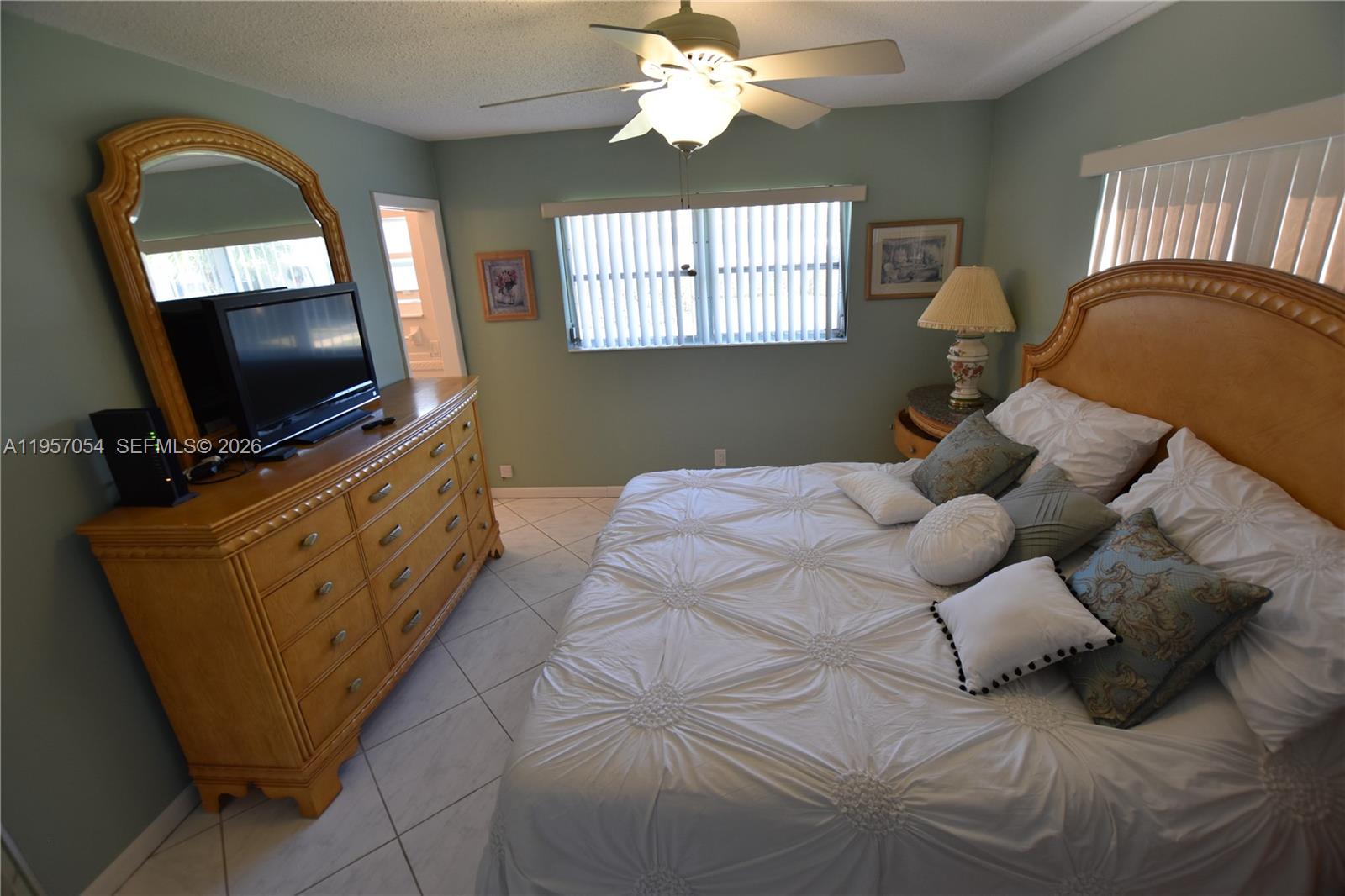 Elegant master bedroom retreat at 2750 Emory Dr East - Condo in West Palm Beach