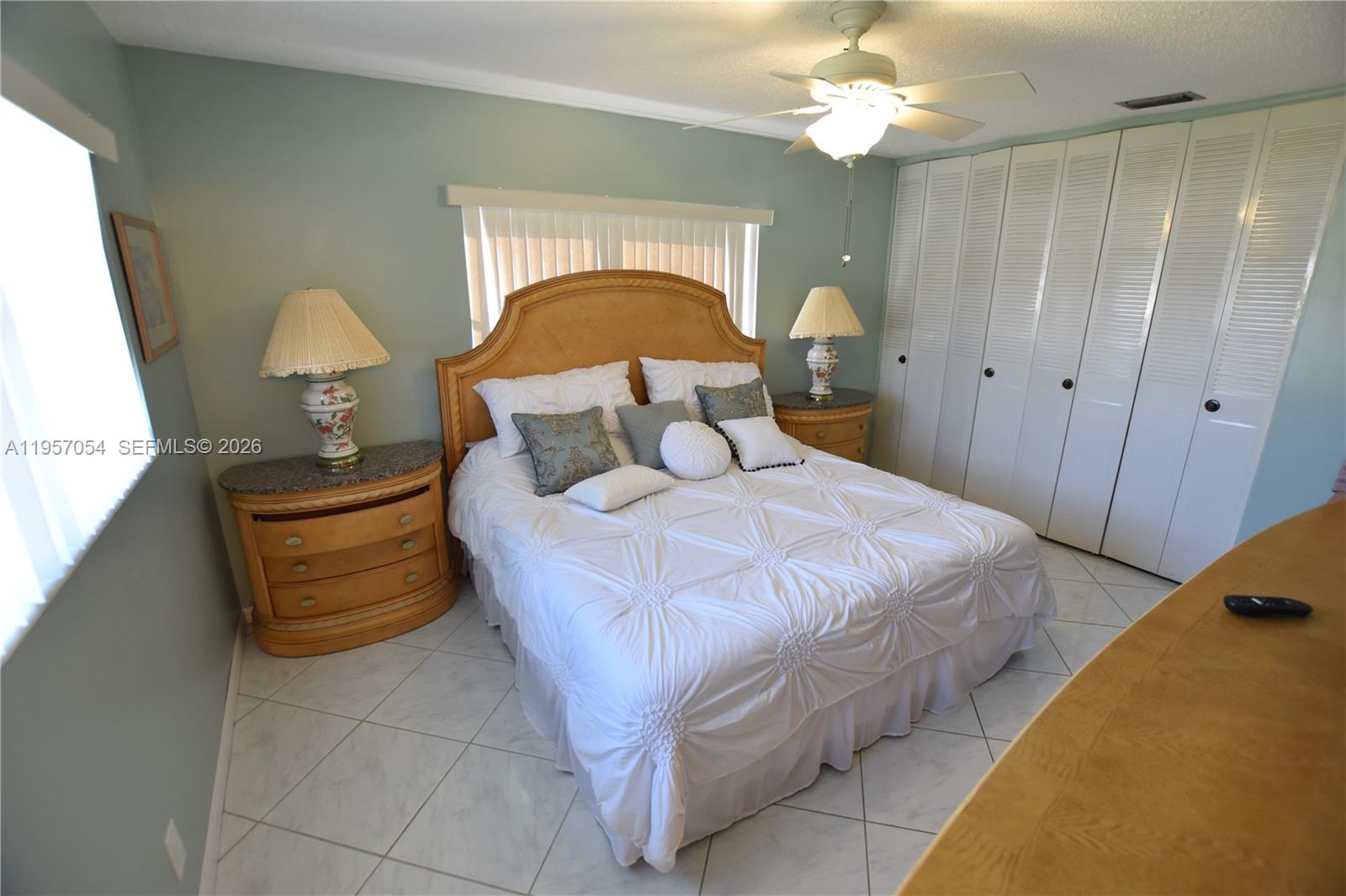 Well-appointed guest bedroom at 2750 Emory Dr East - Condo in West Palm Beach