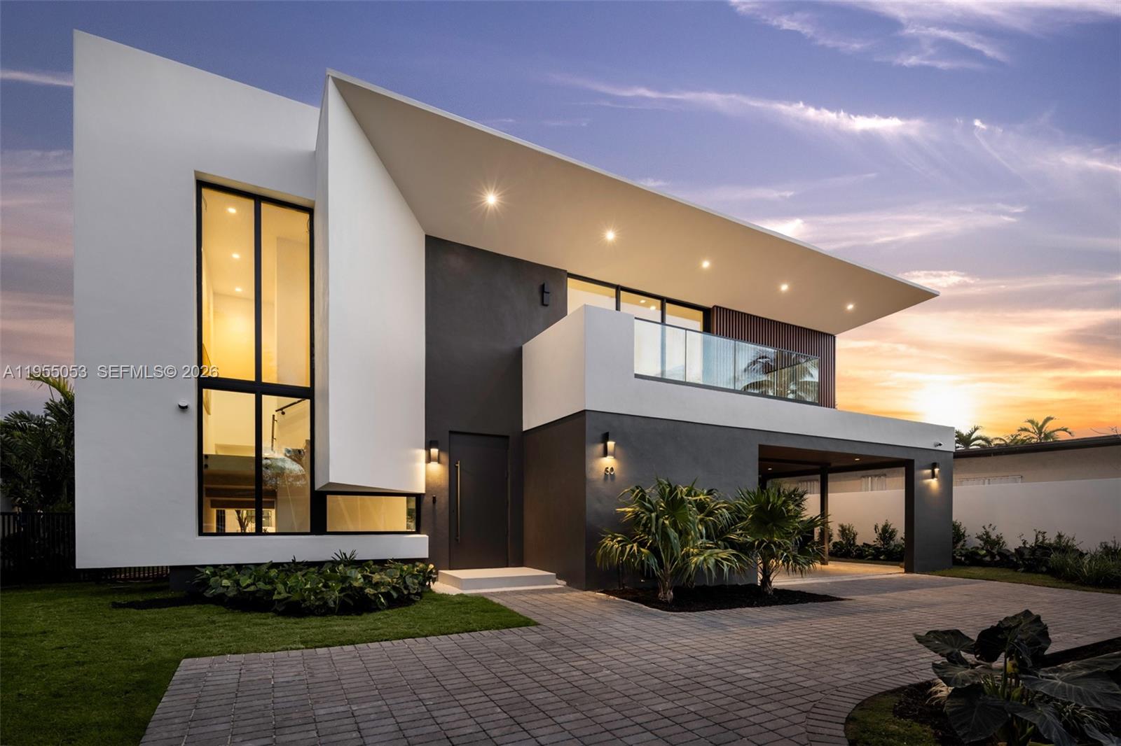Casa 30 is a newly built modern masterpiece in North Coconut Grove’s exclusive, patrol-secured Bay Heights. Elevated above the flood zone, this private sanctuary offers refined living with prime access to parks, the Grove, and downtown. Developed by Urbane Capital and Billskog Construction, it features Italian Pedini millwork, Miele appliances, soaring ceilings, custom finishes, a private elevator, a gym, a loft with midnight kitchen, and a luxurious primary suite with a spa-style bath, dressing room, and private terrace overlooking the lush, walled garden. Outdoor living includes a summer kitchen and heated saline pool with spa — a true expression of contemporary luxury.