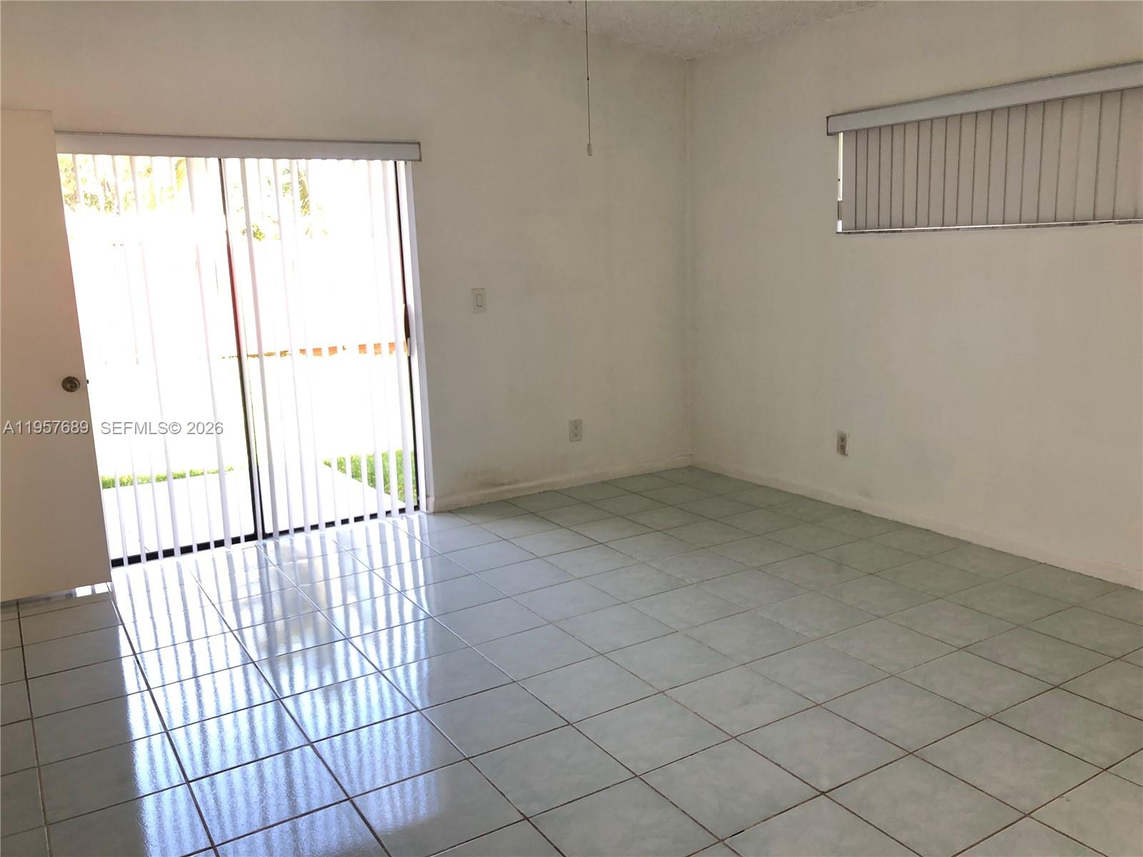 Open-concept living area at 719 3rd Ave - Home in Dania Beach
