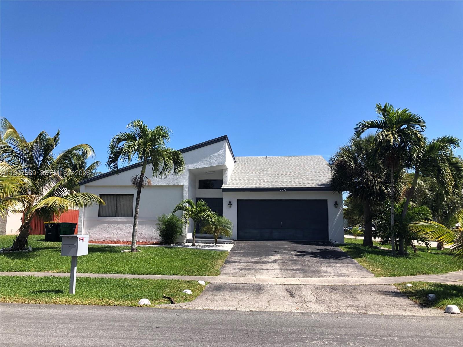 Elegant master bedroom retreat at 719 3rd Ave - Home in Dania Beach