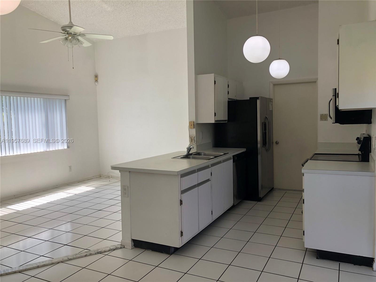 Spacious garage and storage at 719 3rd Ave - Home in Dania Beach