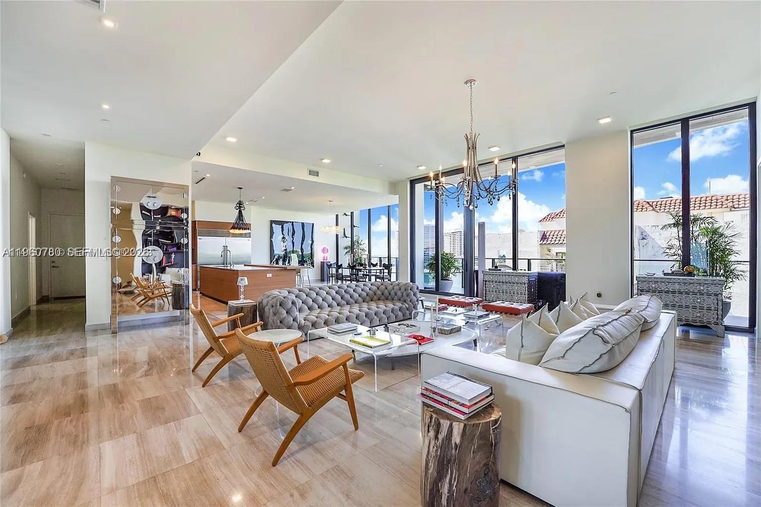 Welcome to Penthouse 605 at The Fairchild, Coconut Grove—an architectural masterpiece where waterfront livingmeets timeless design. This 4-bedroom plus service quarters, 5.5-bath residence spans 3,886 SF, featuring 13foot ceilings, natural stone floors, and floor-to-ceiling glass framing breathtaking bay and city views. A sleekPoliform kitchen with Wolf and Sub-Zero appliances and a wet bar anchors the expansive layout, ideal for botheveryday living and entertaining. Enjoy over 1,200 SF of private terraces and an elevated lifestyle with resort-styleamenities including a rooftop pool with cabanas, summer kitchen and BBQ area, spa, hammam, sauna, and stateof-the-art fitness center. A 32-foot boat slip with a 10,000 lb boat lift is available for purchase or lease, offeringseamless access to Biscayne Bay—an exceptional opportunity for boating enthusiasts. This is a rare opportunity foran investor seeking immediate cash flow or an end user looking for a premier waterfront home in Coconut Grove.The seller is highly motivated, making this the best-priced penthouse in all of Coconut Grove. Owner financingavailable.