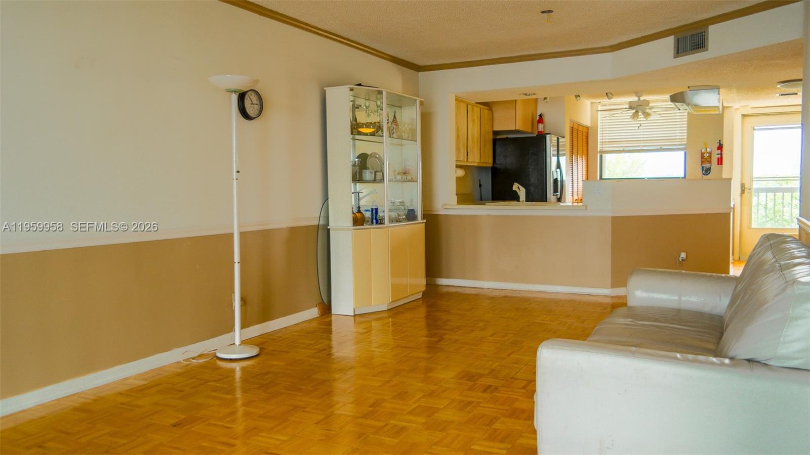 Modern kitchen with designer features at 116 Lake Emerald Dr - Condo in Oakland Park