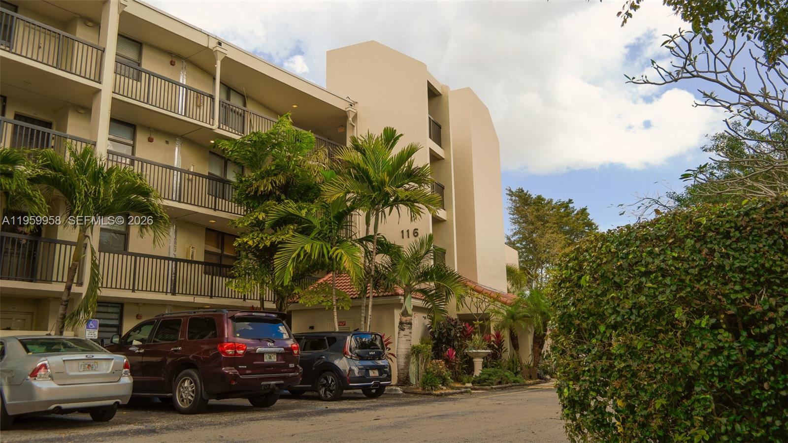 Spacious living room with panoramic views at 116 Lake Emerald Dr - Condo in Oakland Park