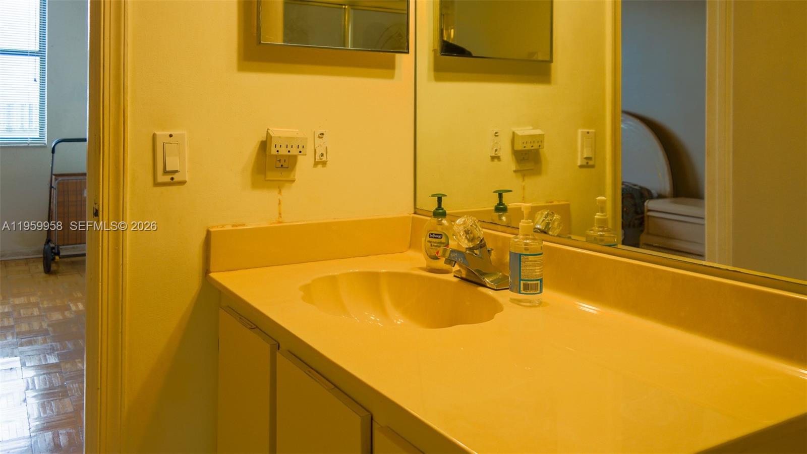 Modern kitchen with designer features at 116 Lake Emerald Dr - Condo in Oakland Park