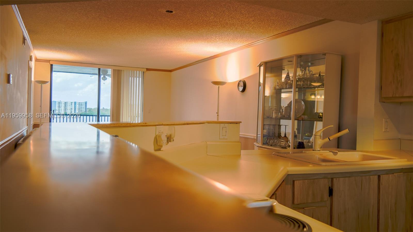 Modern kitchen with designer features at 116 Lake Emerald Dr - Condo in Oakland Park
