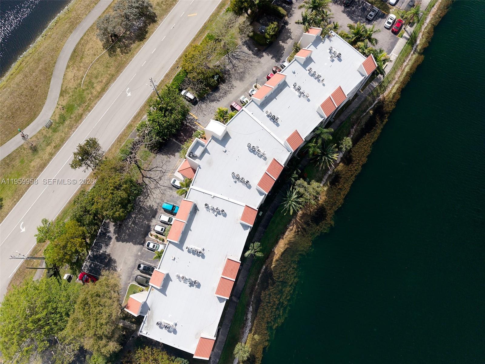 Spacious living room with panoramic views at 116 Lake Emerald Dr - Condo in Oakland Park