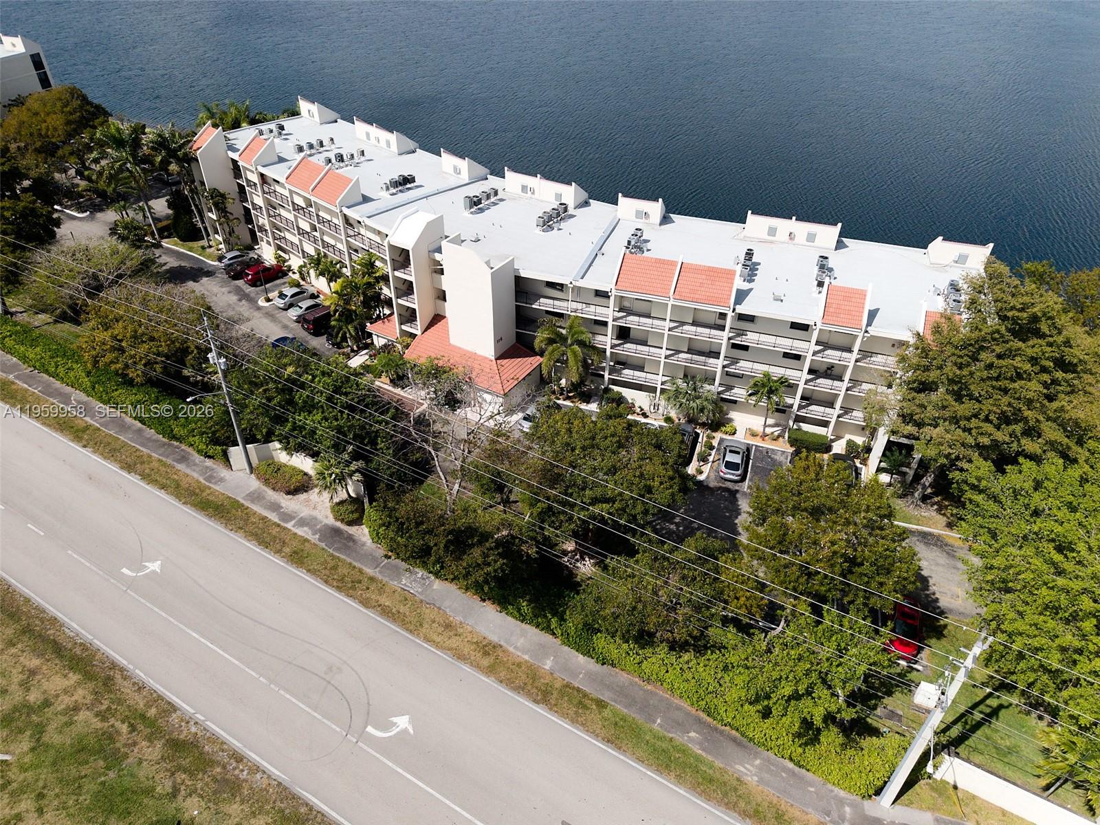 Modern kitchen with designer features at 116 Lake Emerald Dr - Condo in Oakland Park