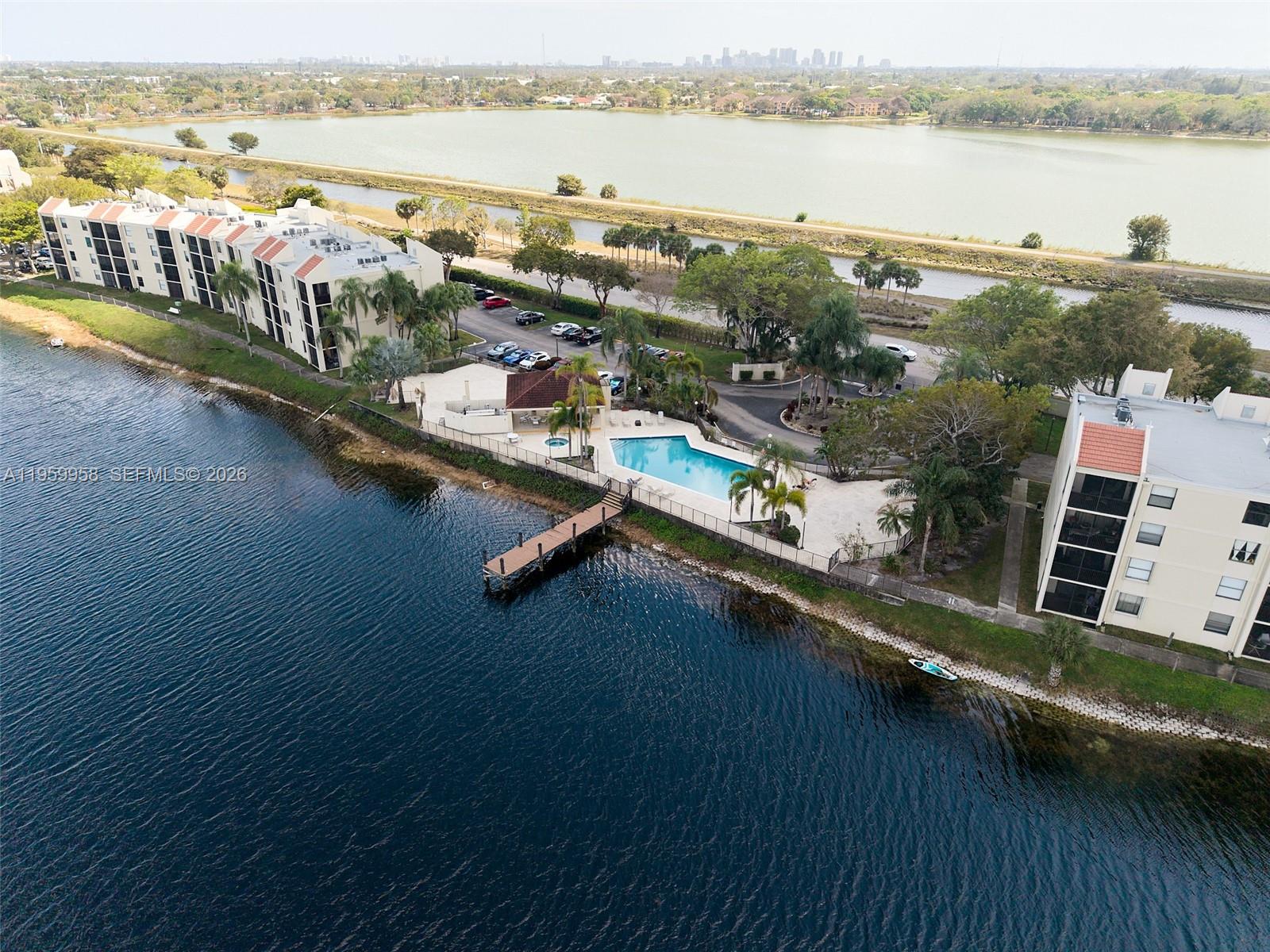 Spacious living room with panoramic views at 116 Lake Emerald Dr - Condo in Oakland Park