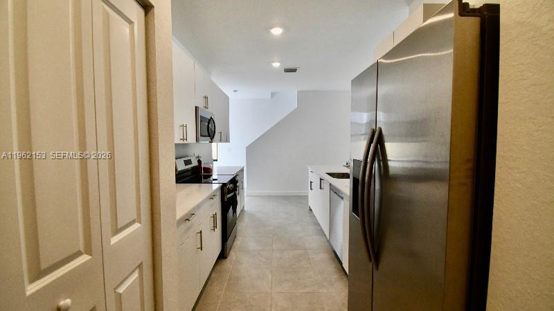 Additional living spaces at 4949 Peacock Way - Townhouse in Dania Beach