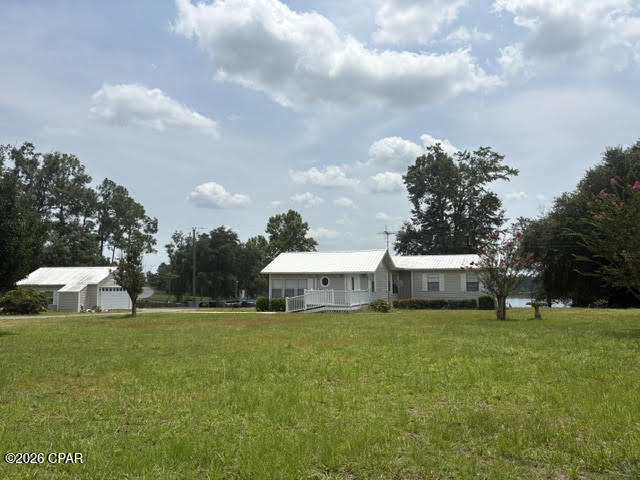 1st image of 24798 Nw County Road 73a, Altha, FL 32421 | MLS# 785203