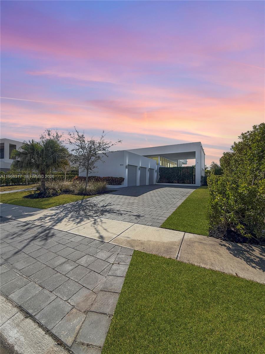 Live in luxury in this spectacular single-story residence located in the exclusive gated community of Botaniko Weston. Built in 2019, this property features 4 spacious bedrooms, 5.5 bathrooms, and a 3-car garage, all spread over 3,389 square feet of elegant and functional space. Its modern design offers high ceilings, abundant natural light, and top-of-the-line finishes. Enjoy an incredible backyard with a private pool, summer kitchen, and wet bar—perfect for entertaining family and friends. Sliding glass doors seamlessly connect the indoor and outdoor living areas. Botaniko Weston offers privacy, security, and an unbeatable location near top-rated schools, restaurants, shops, and golf courses. This is an opportunity you don’t want to miss!